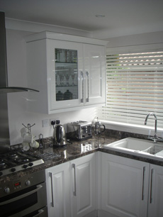 Kitchen fitting with marble work surfaces